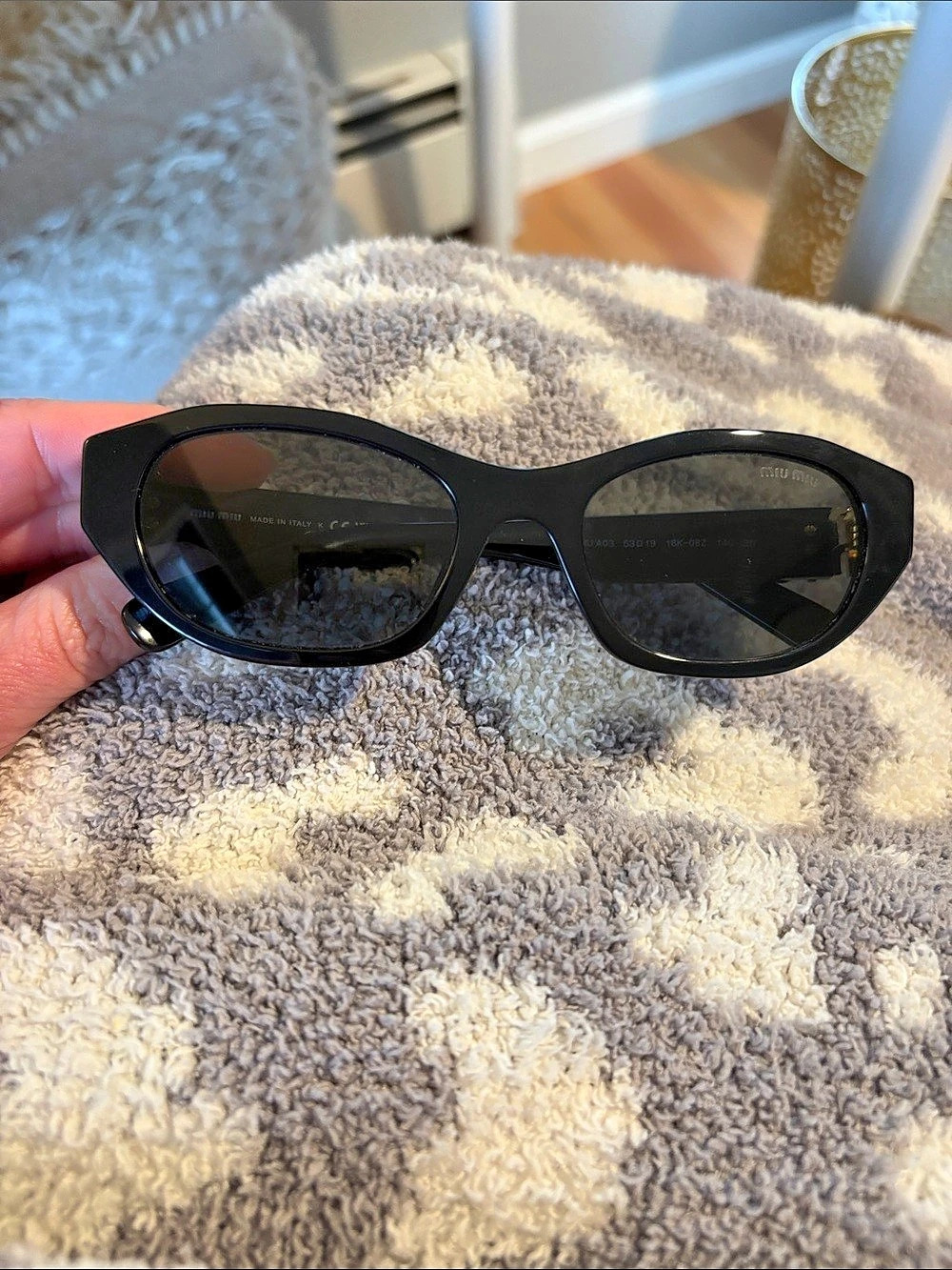 Miu OMU A03S Black Sunglasses with Gold-Tone Logo